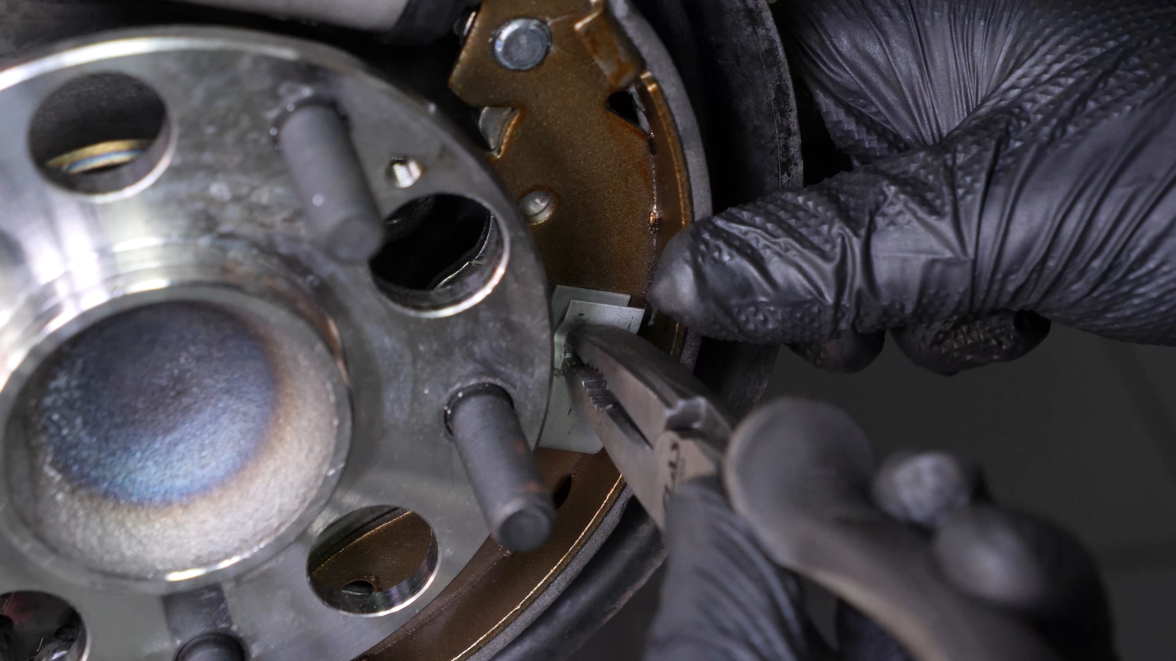 Install the rearward brake shoes