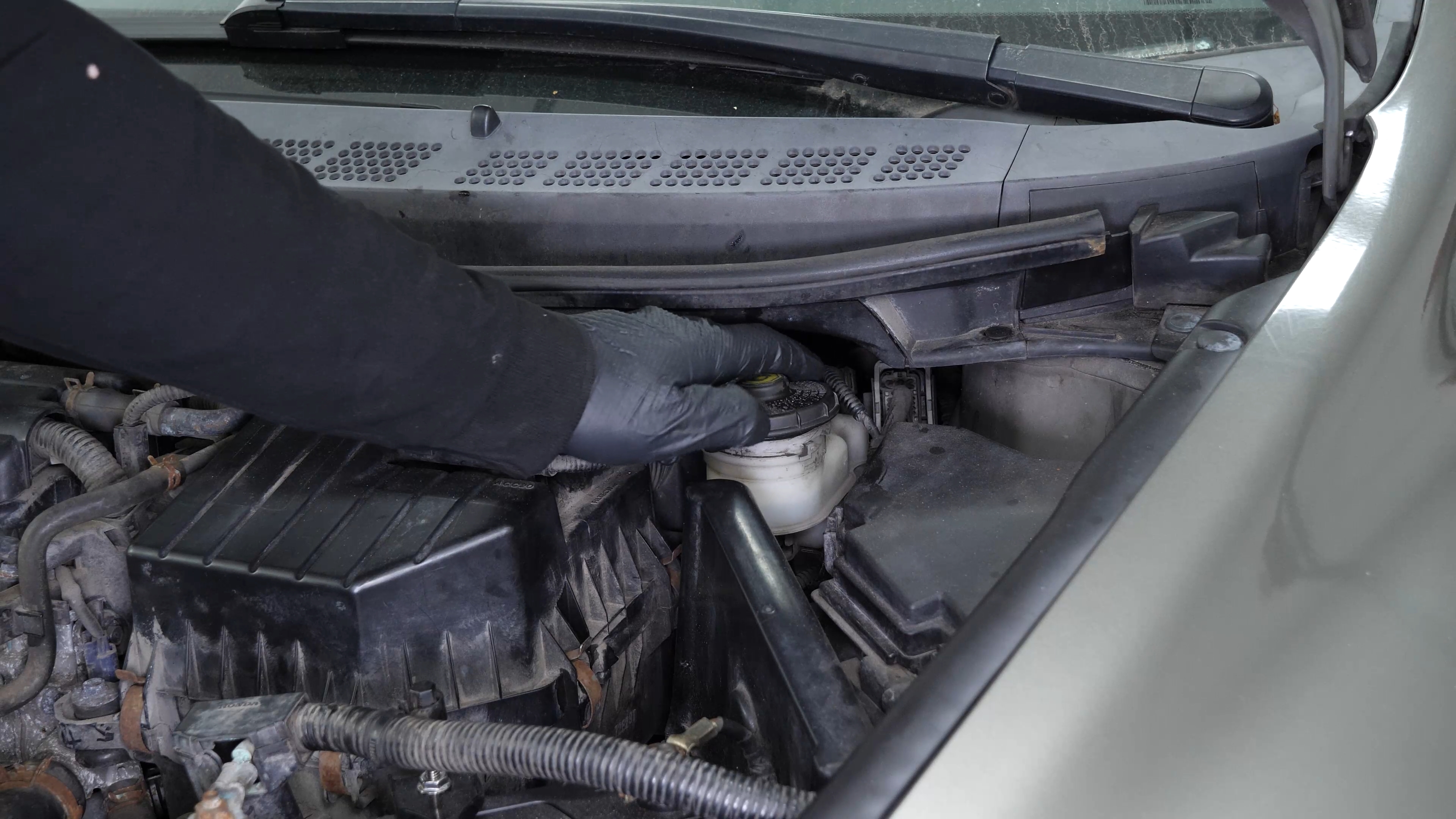 Open the brake fluid reservoir