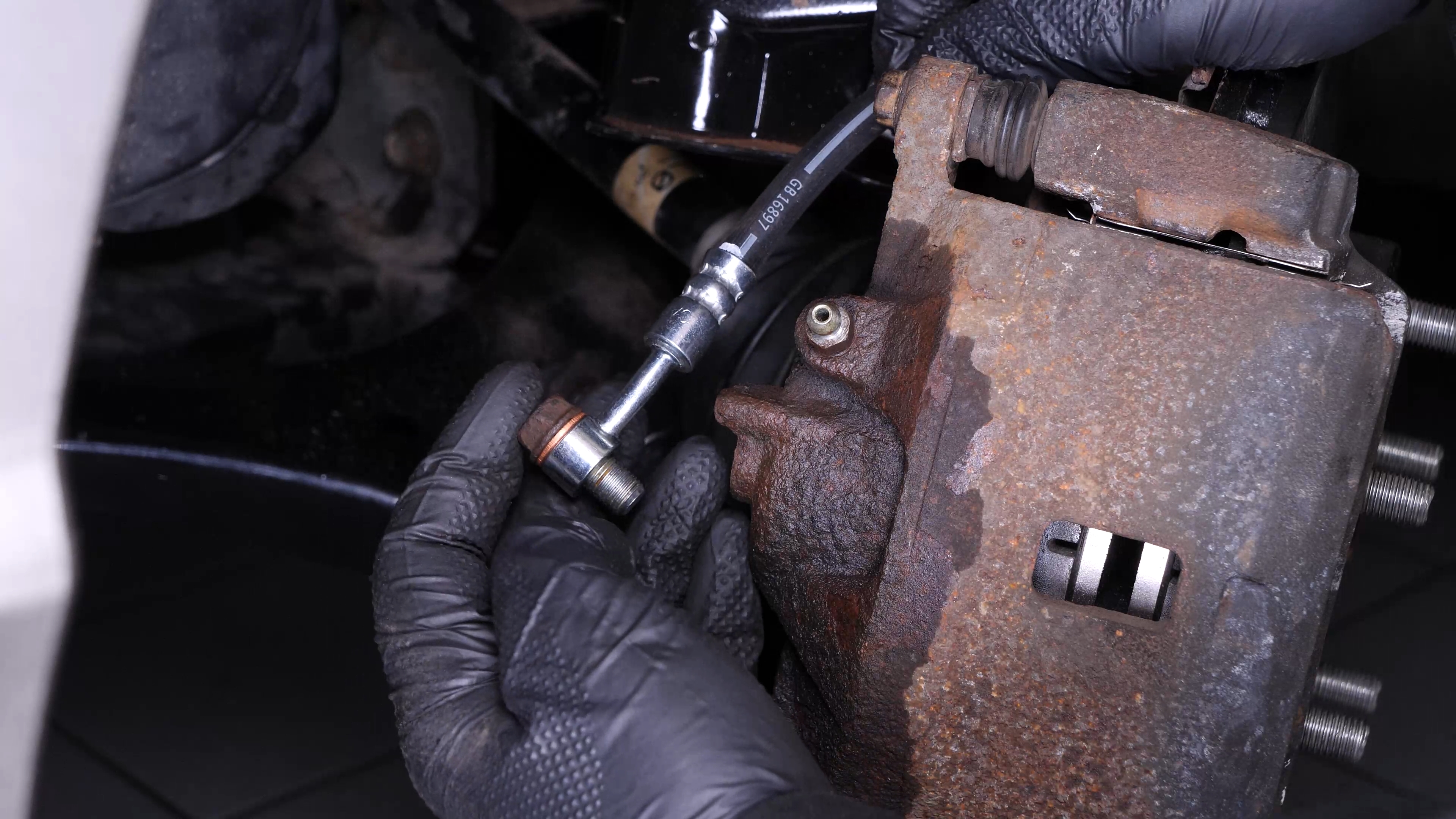 Screw the brake hose back on the caliper