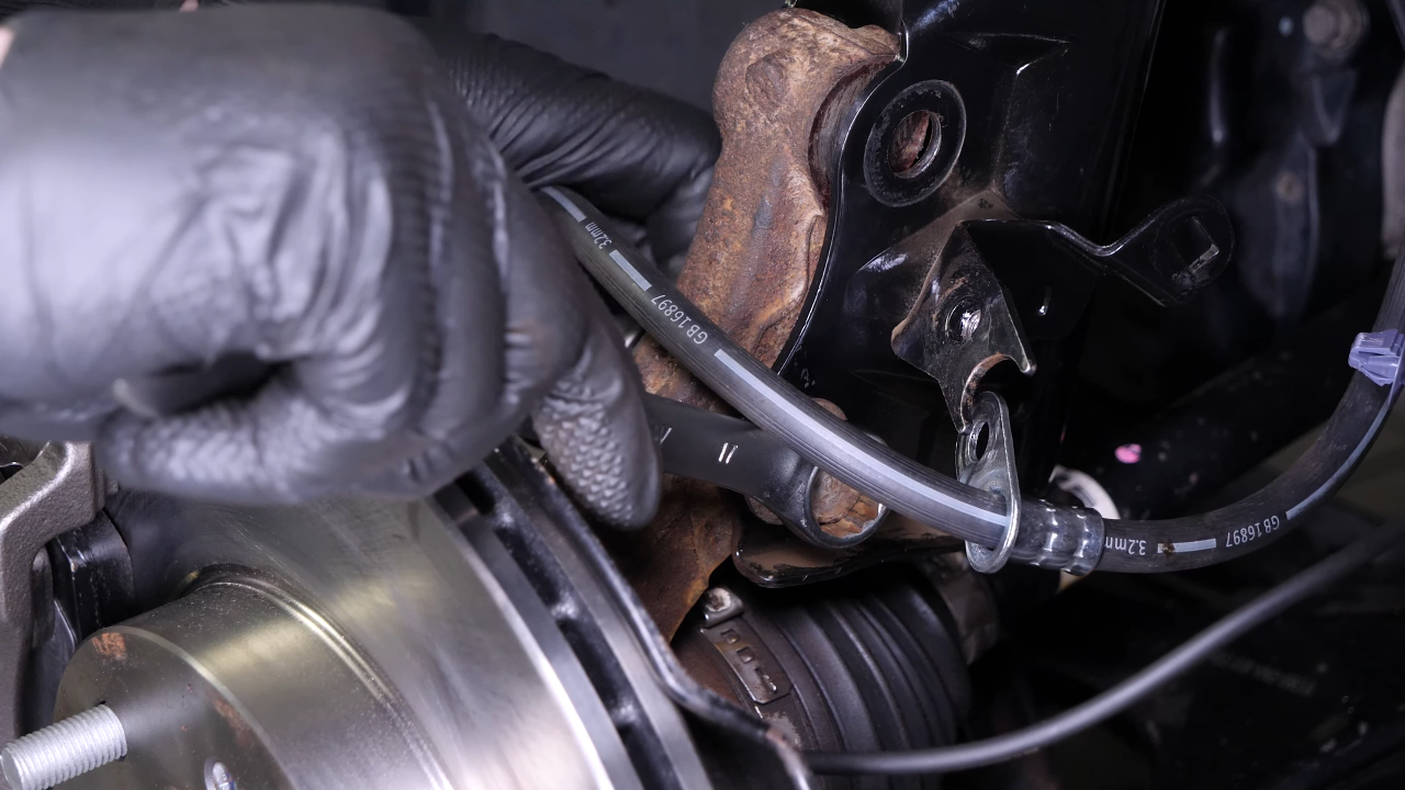 Remove the wheel knuckle