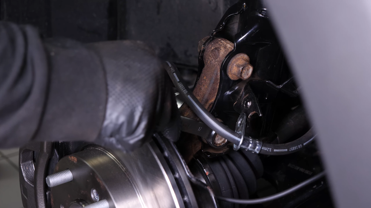 Put the wheel knuckle back in
