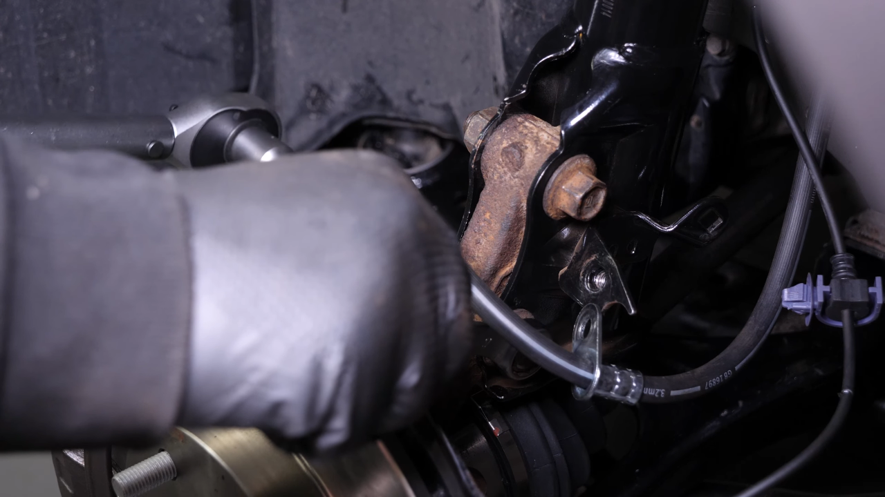 Put the wheel knuckle back in