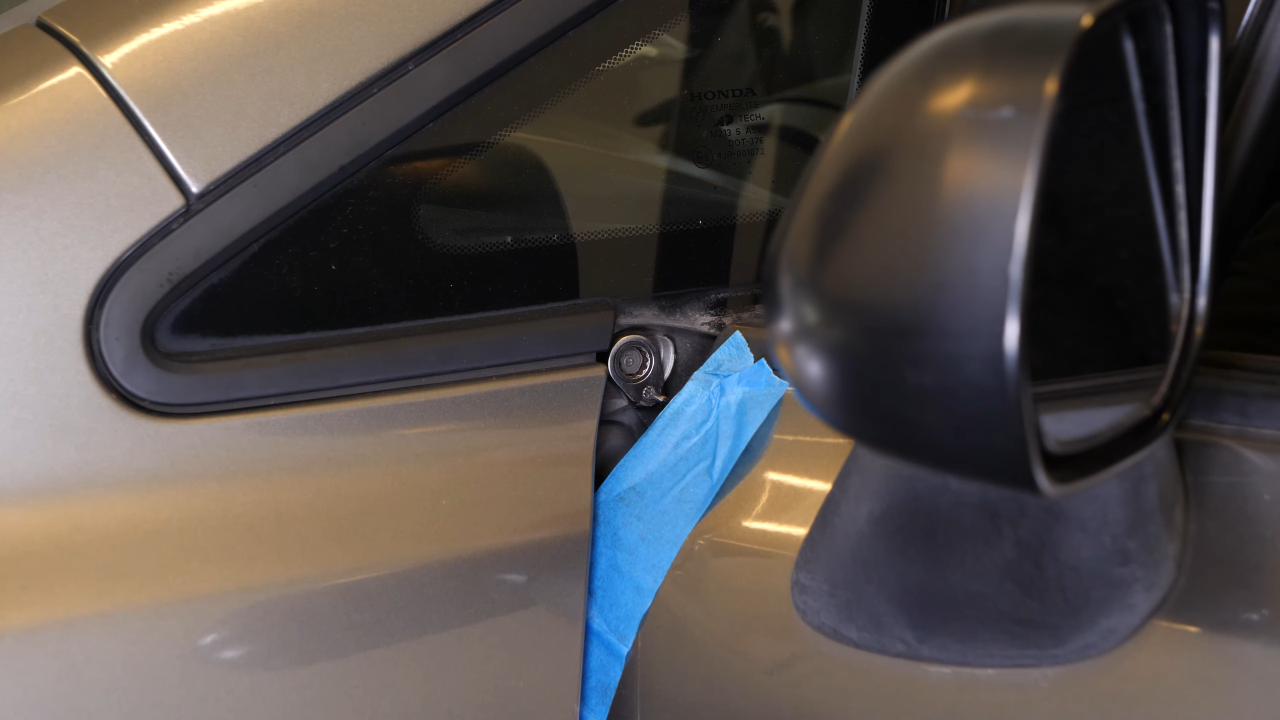 Unscrew the screw inside the door