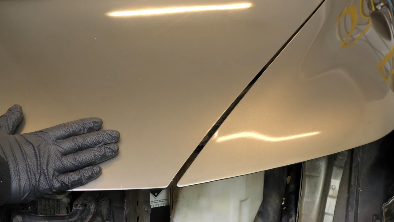 Align the fender with the hood