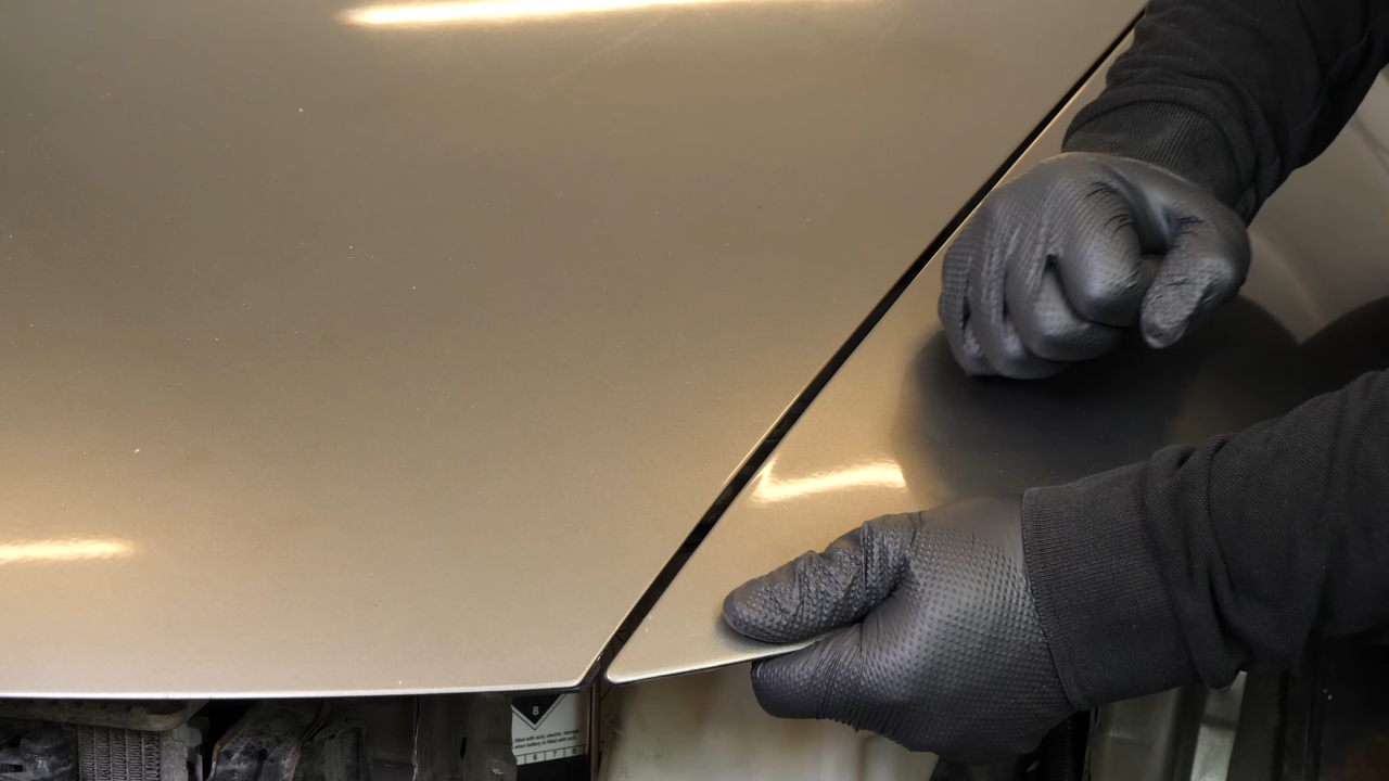Align the fender with the hood