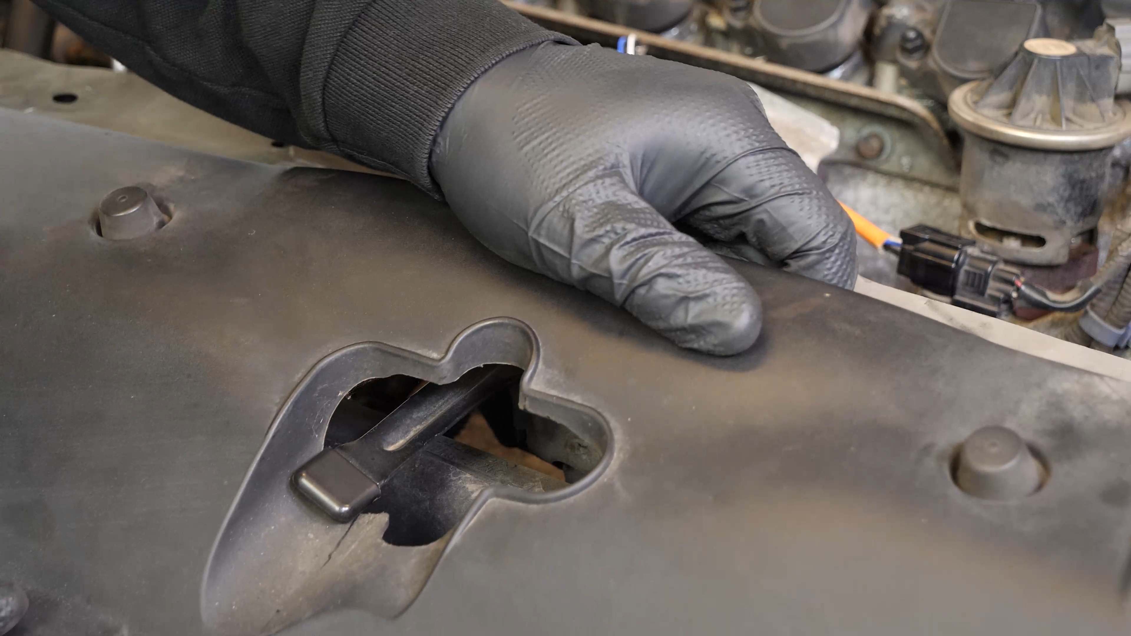 Remove the radiator support cover