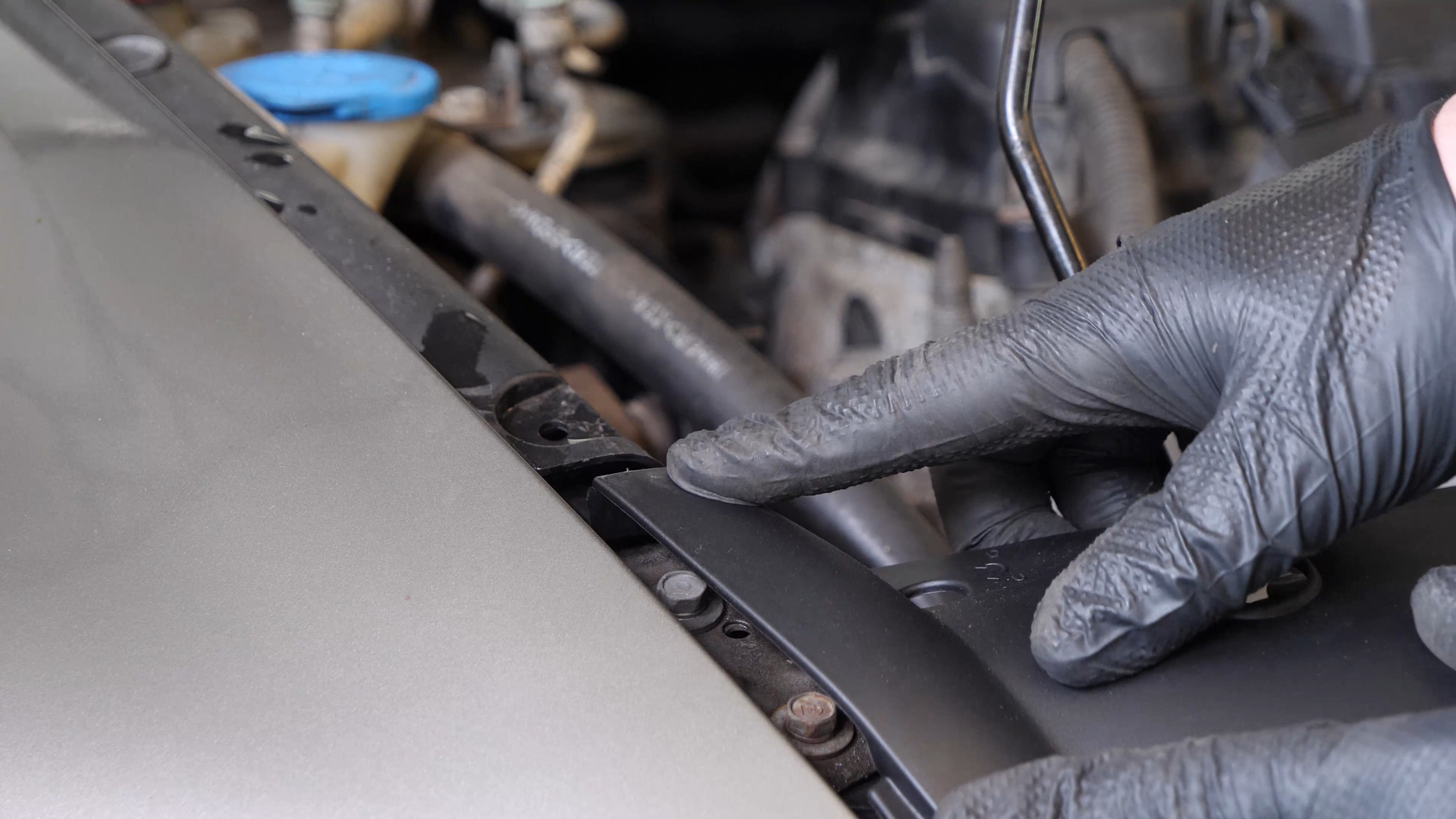 Put the radiator support cover back