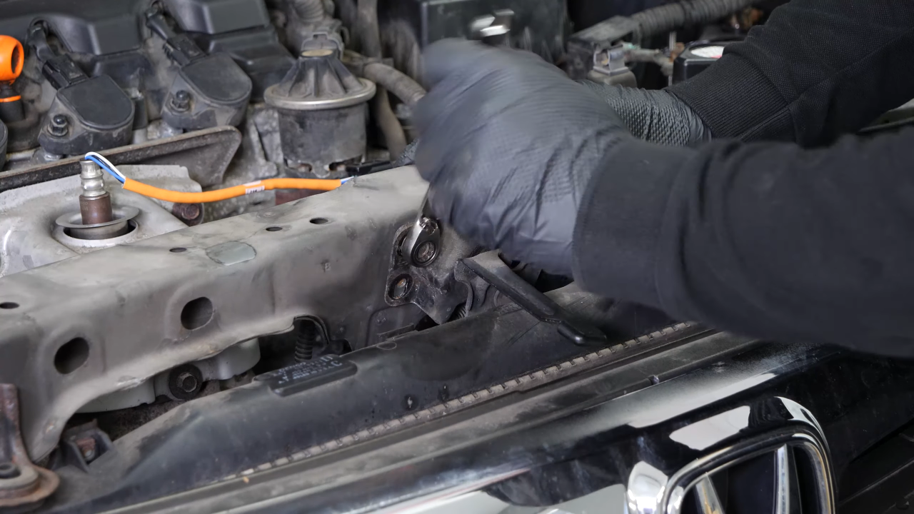 Remove the hood latch