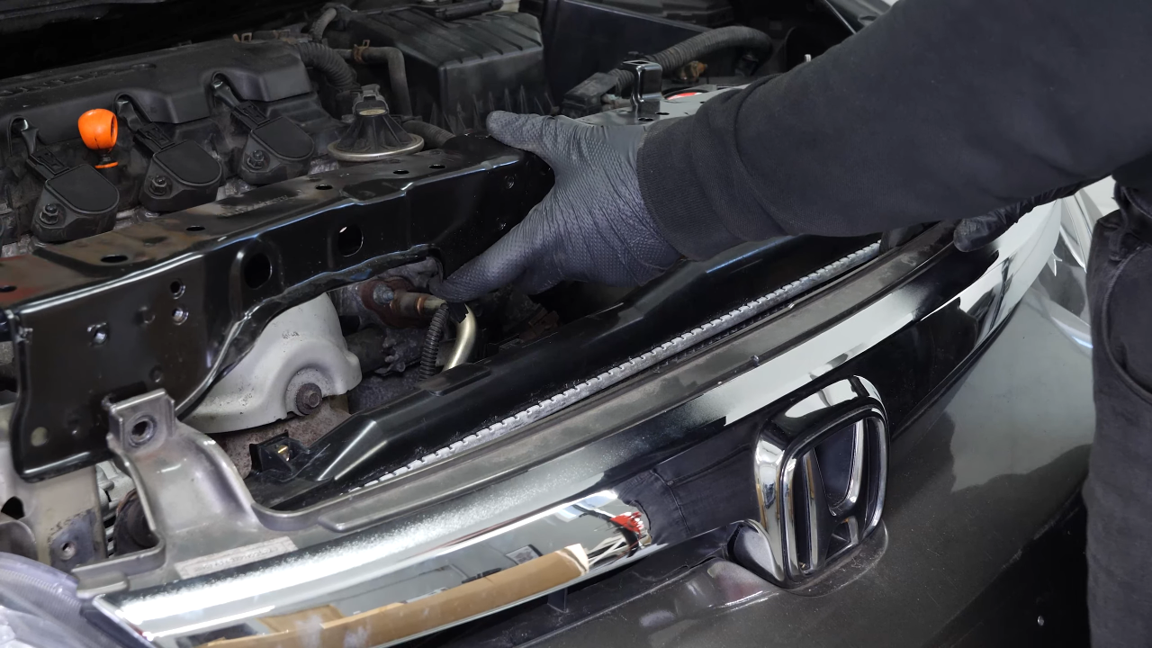 Install the new radiator support