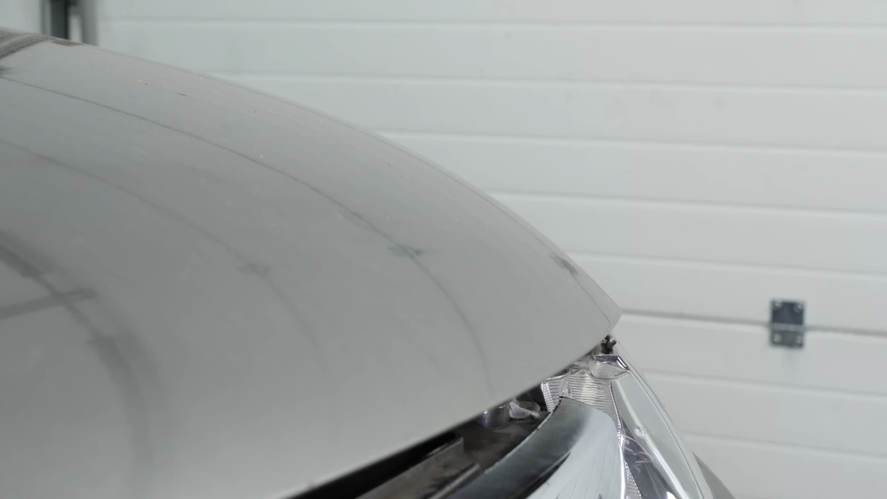 Put the hood latch back