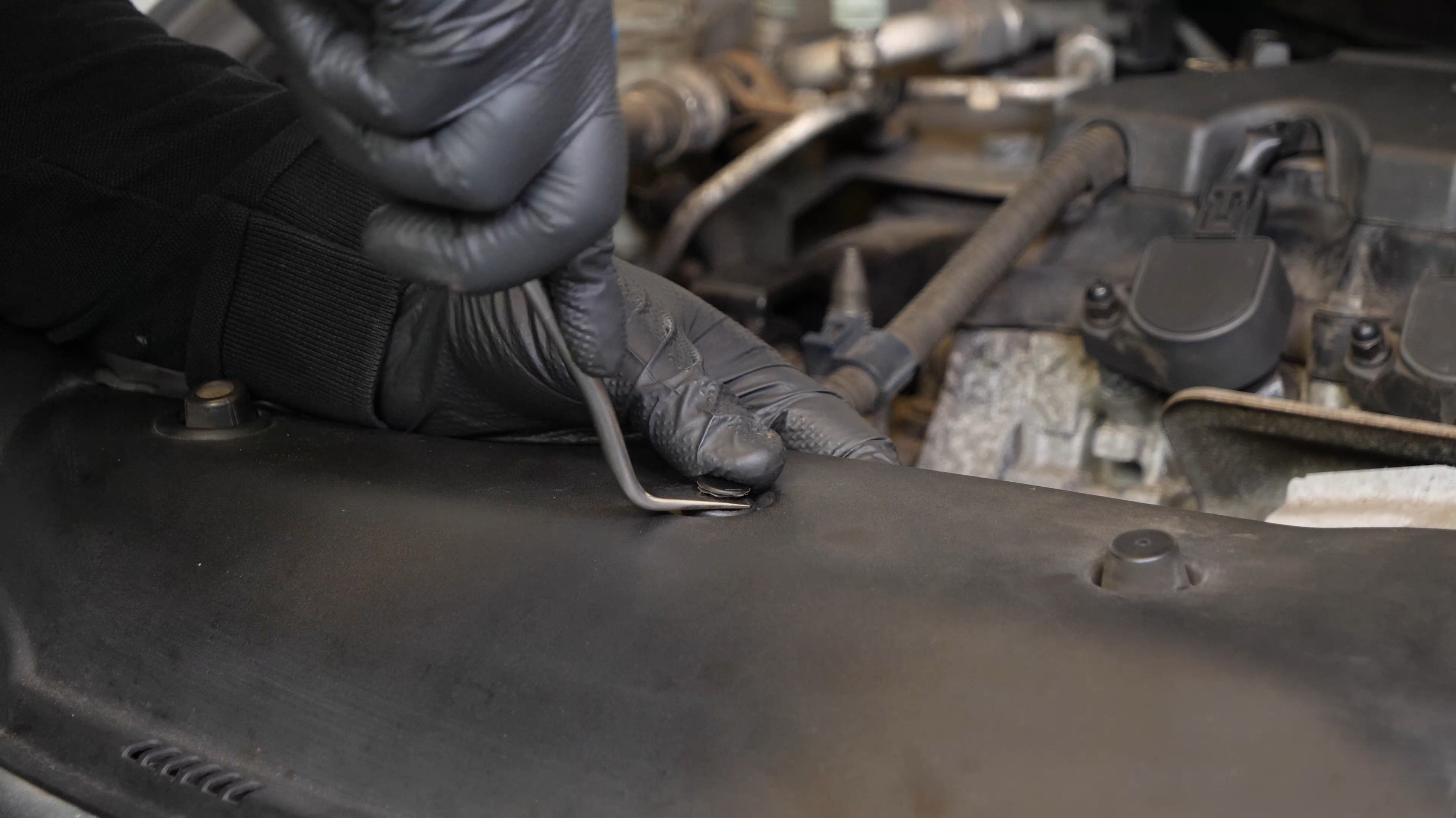 Remove the radiator support cover