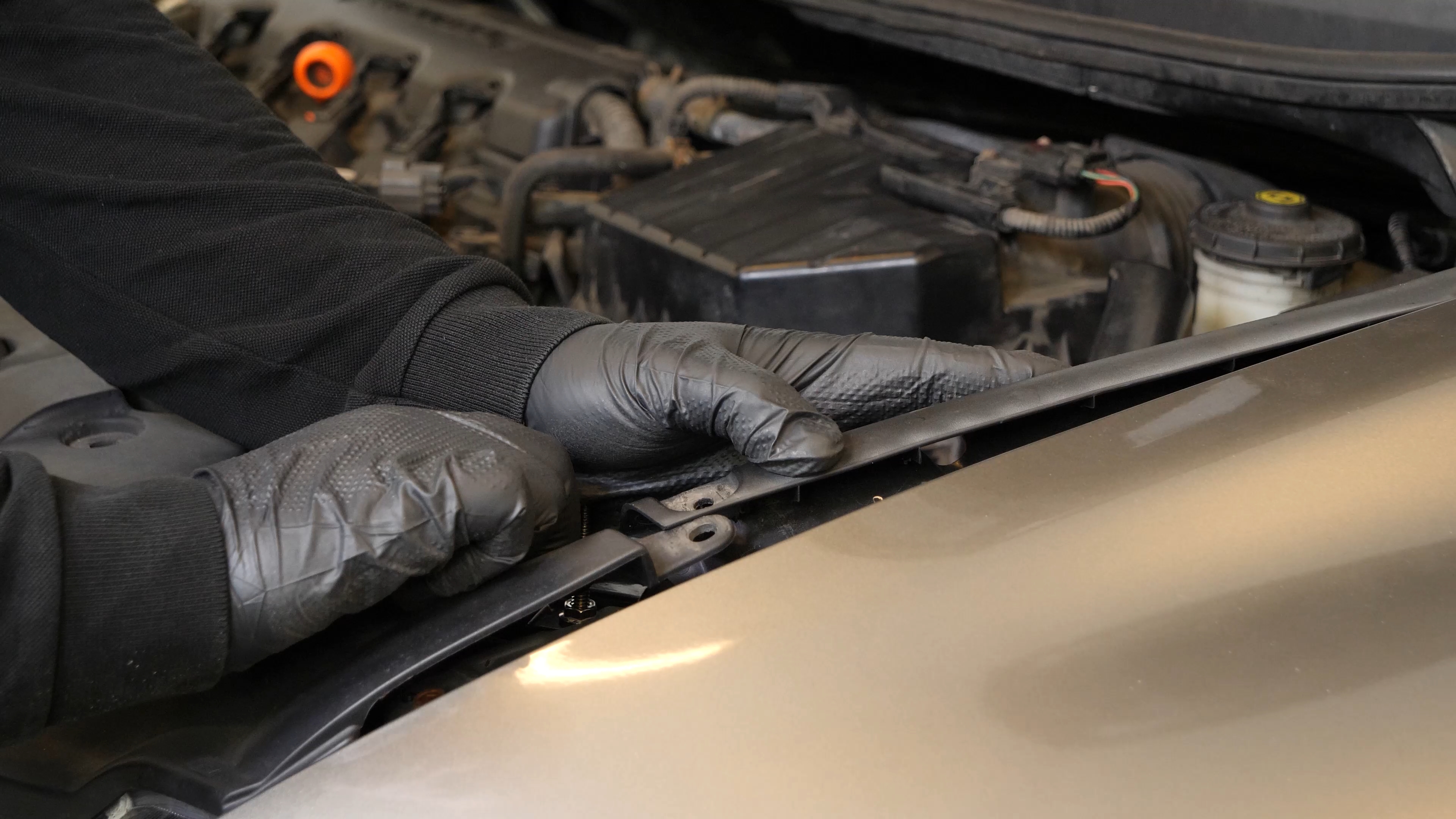 Remove the radiator support cover