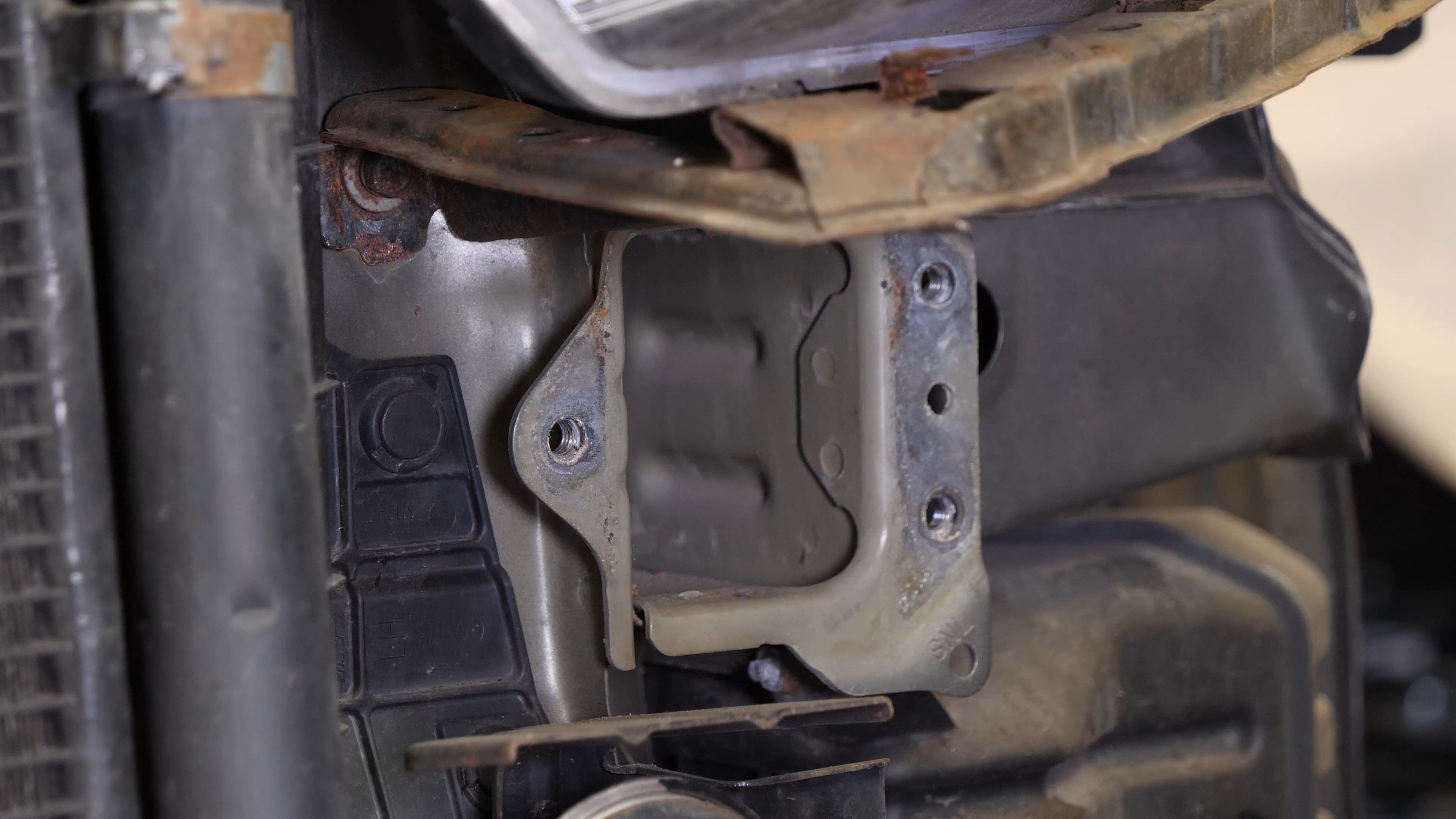 Remove the front  bumper bracket 