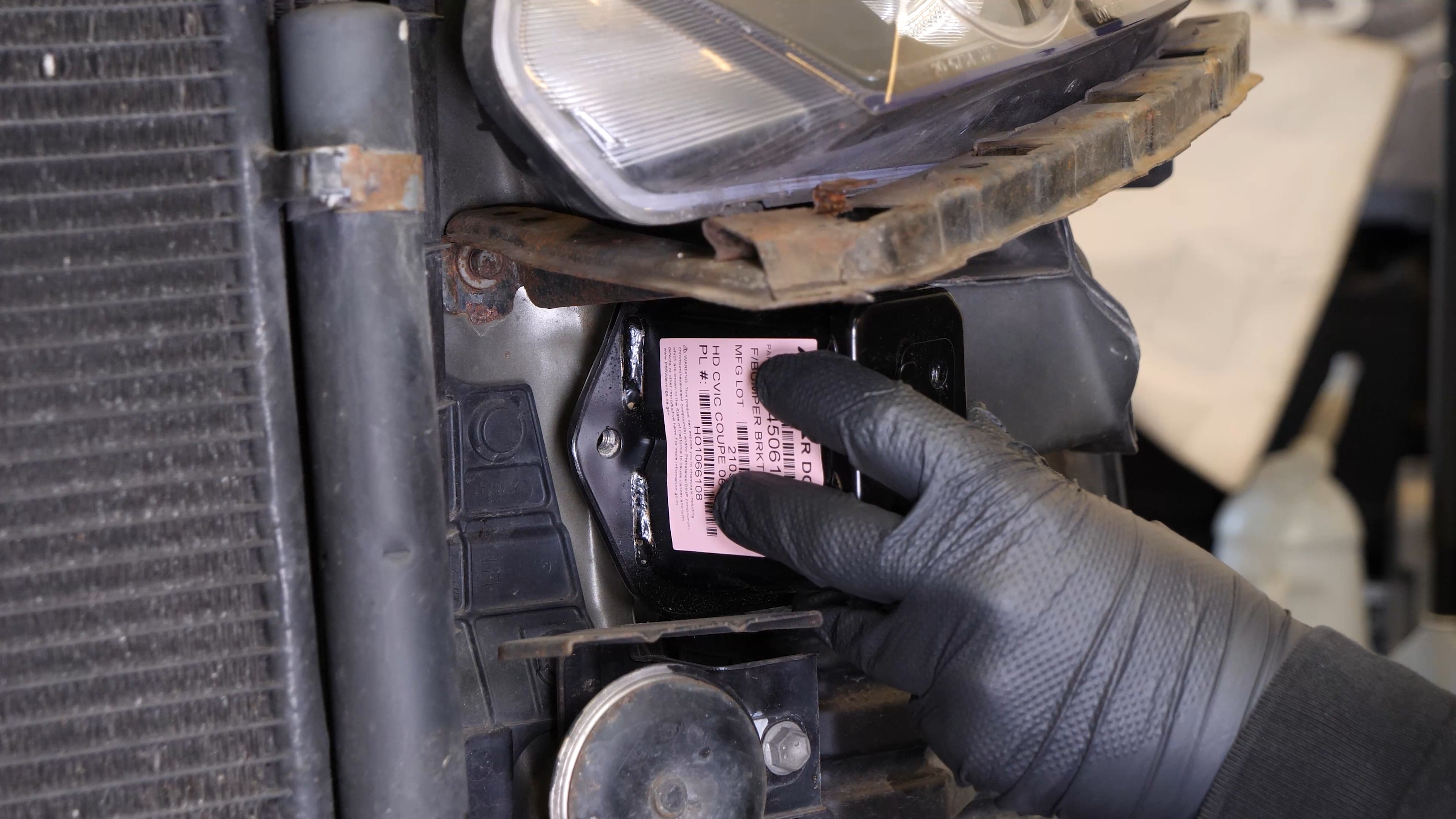Put the front  bumper bracket back 