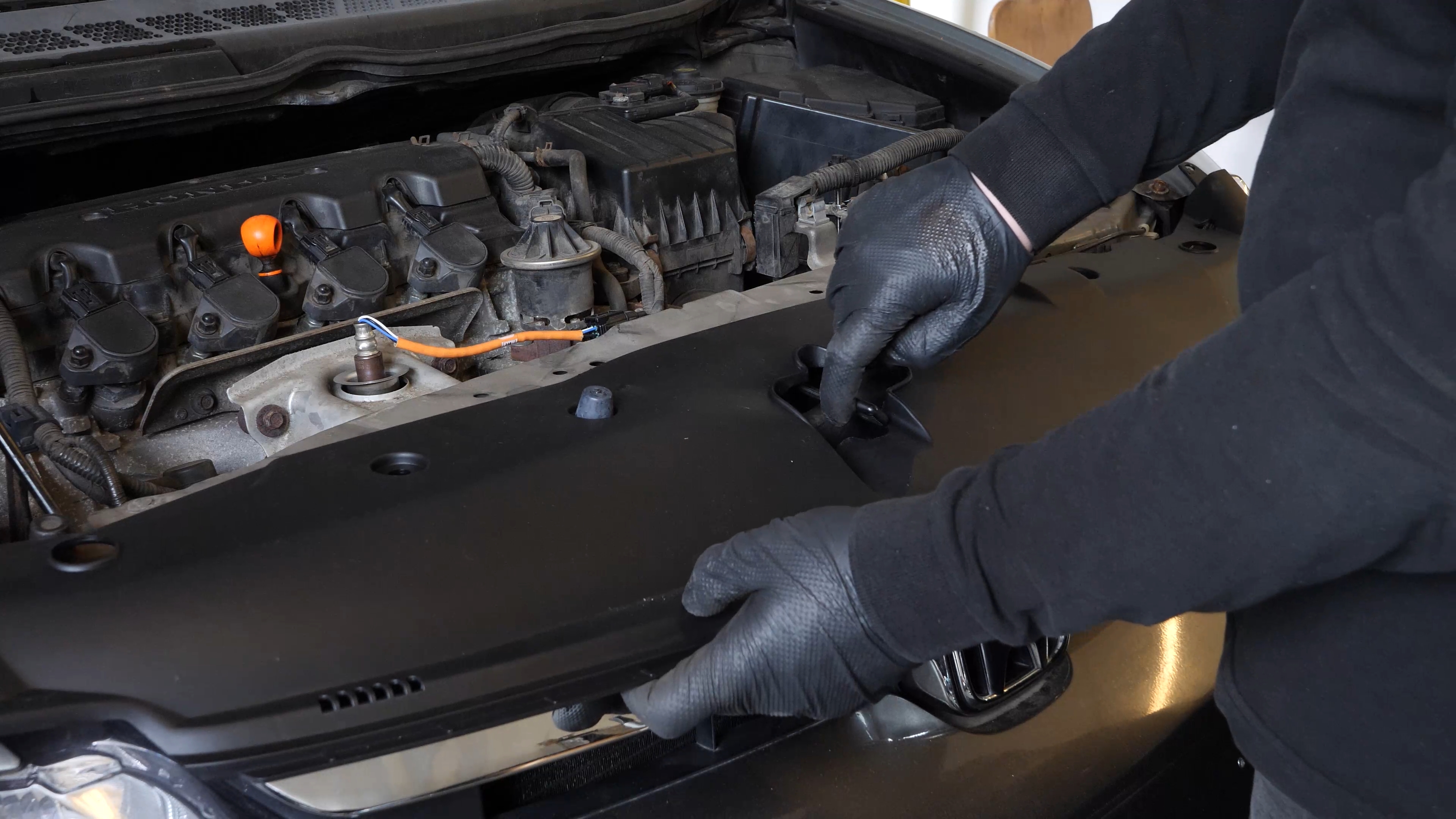 Put the radiator support cover back