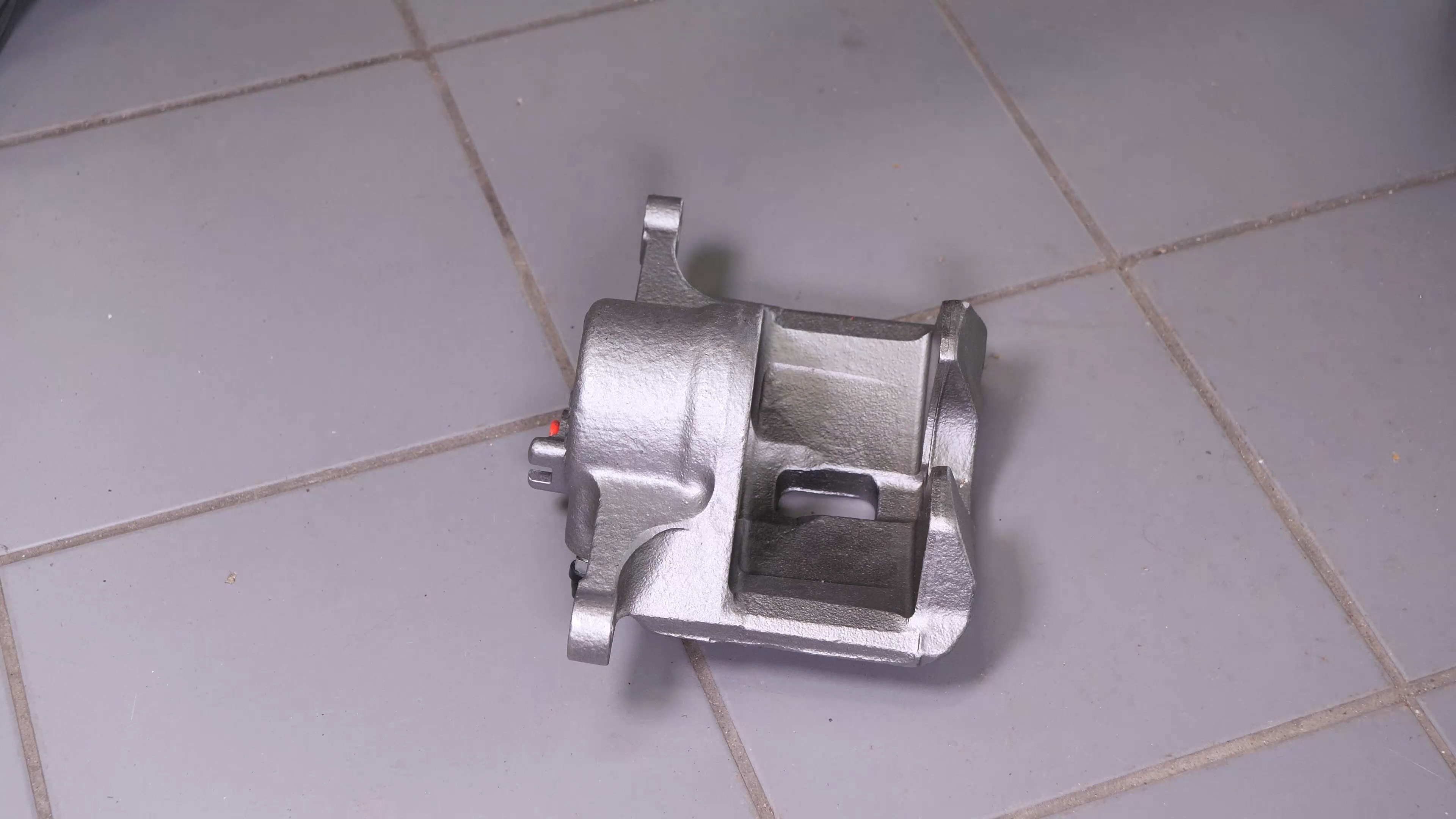 Put the new brake caliper back