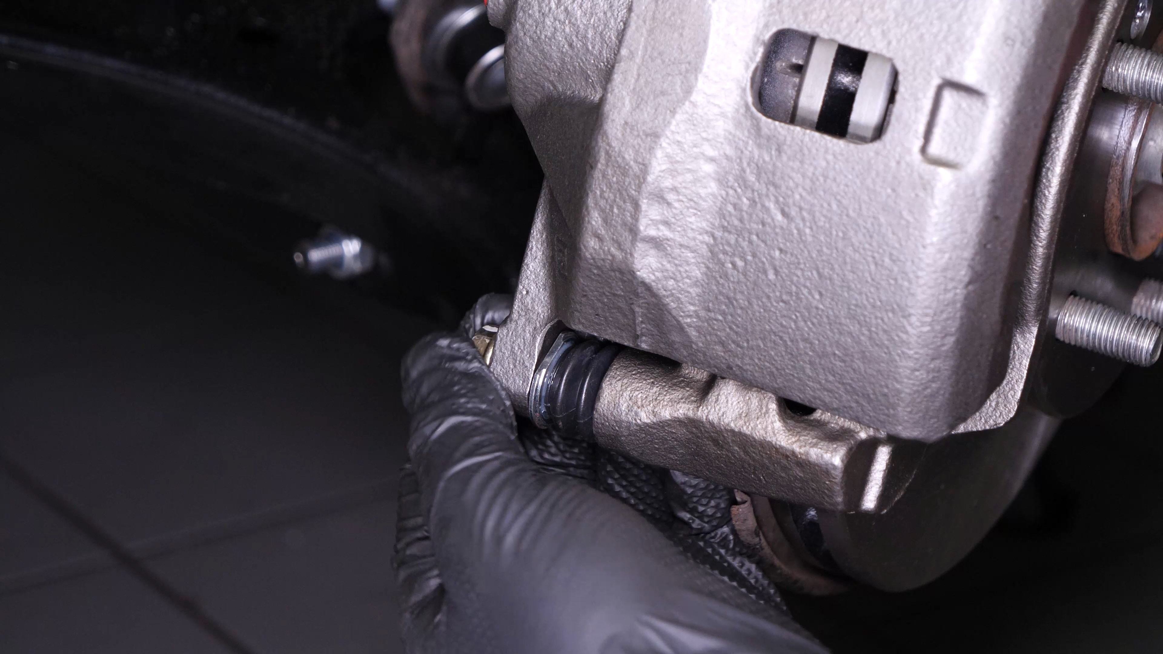 Put the new brake caliper back