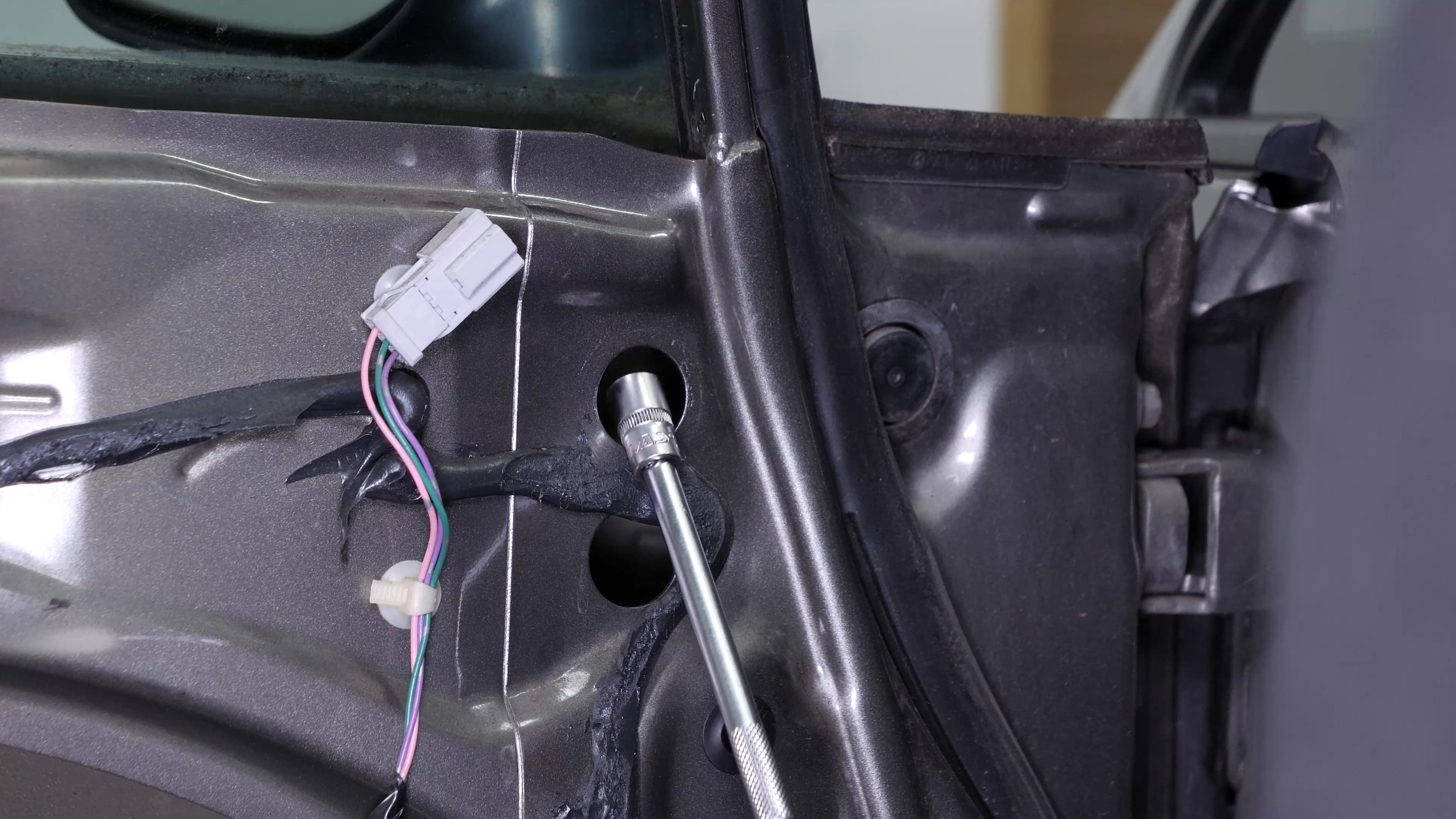 Remove the side view mirror