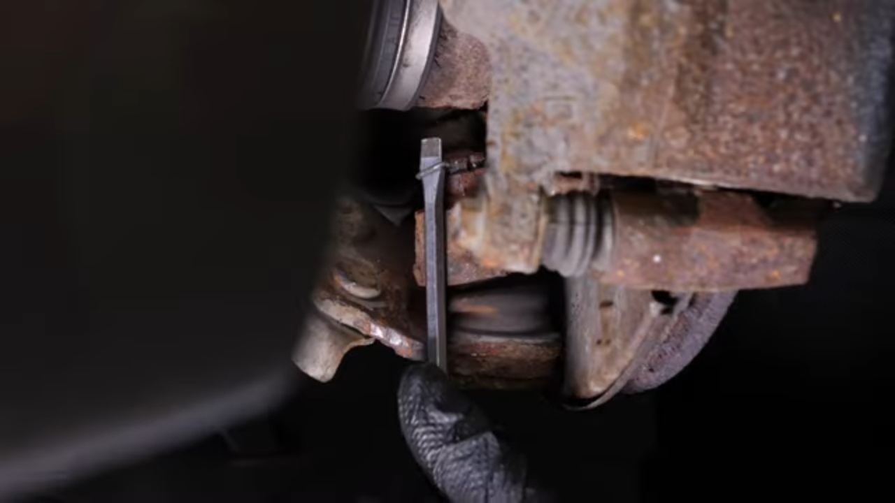 Remove the control arm ball joint