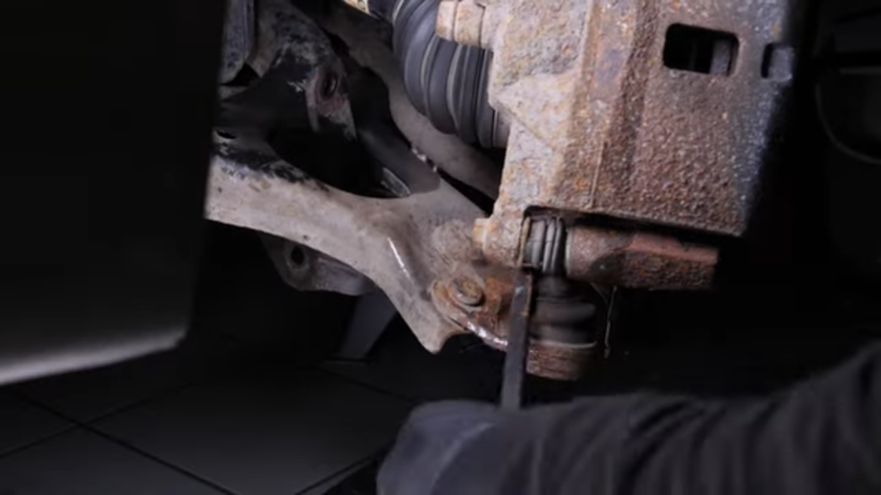 Remove the control arm ball joint