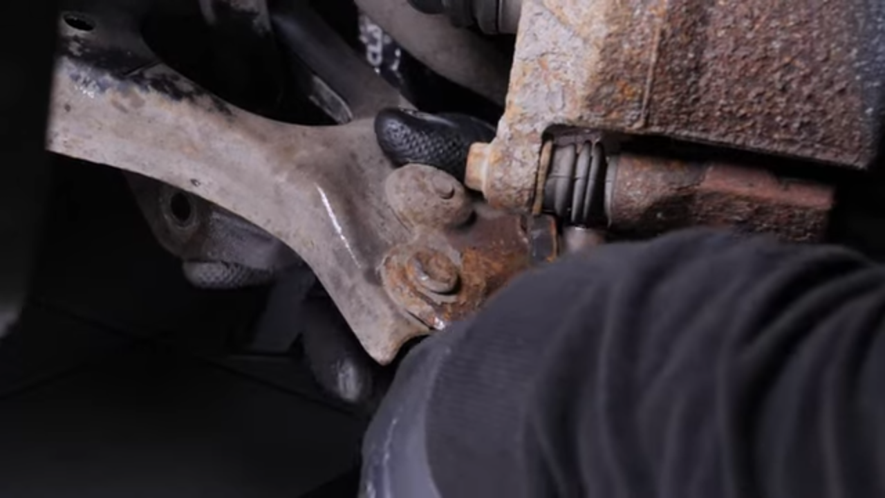 Remove the control arm ball joint