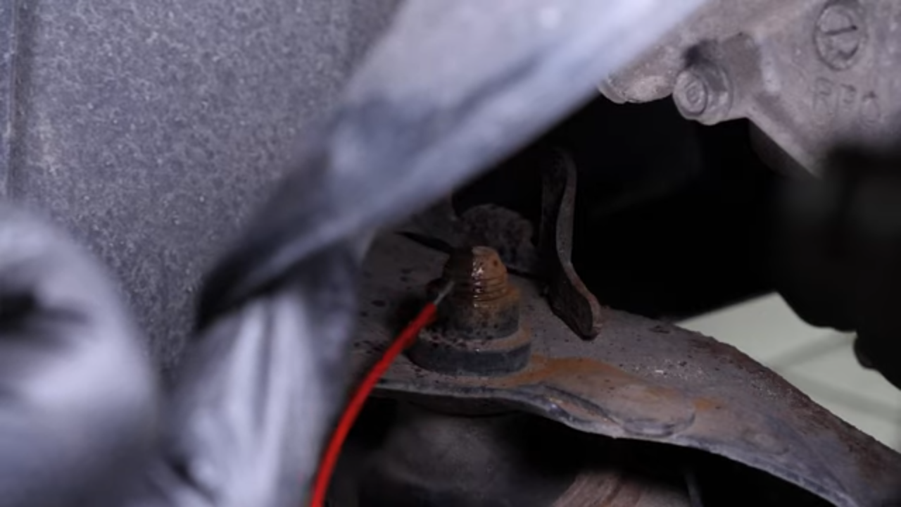 Remove the lower control arm