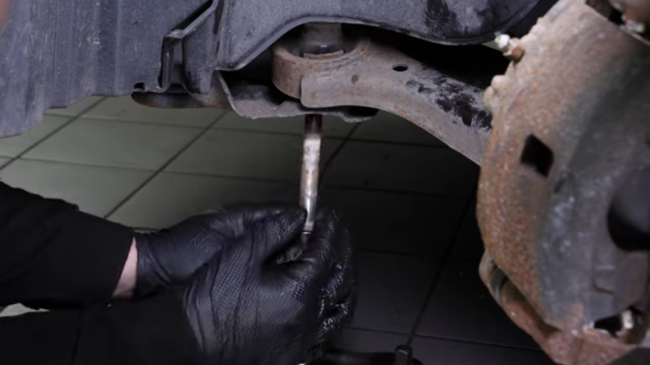 Remove the lower control arm
