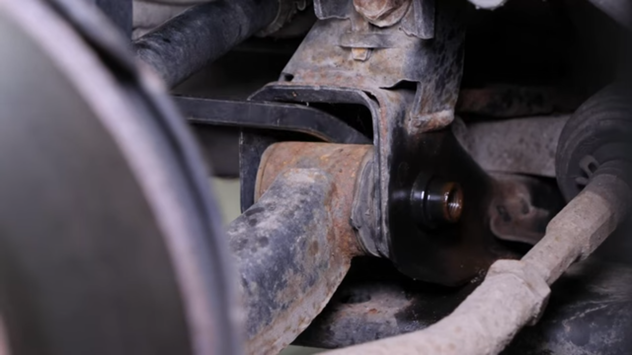 Remove the lower control arm