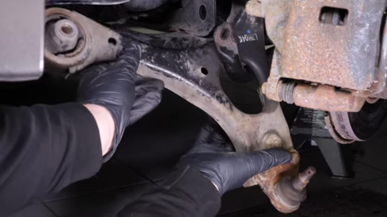 Remove the lower control arm
