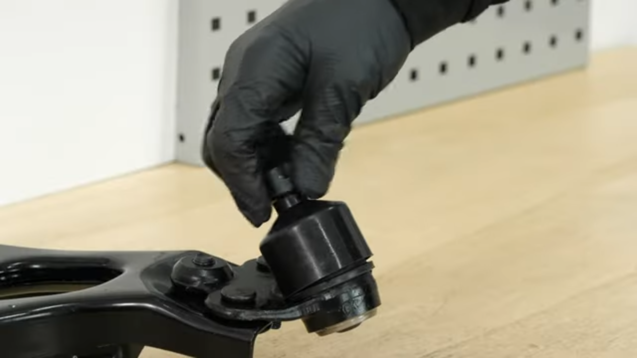 Put the control arm back