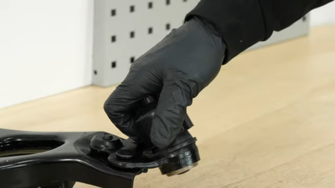 Put the control arm back