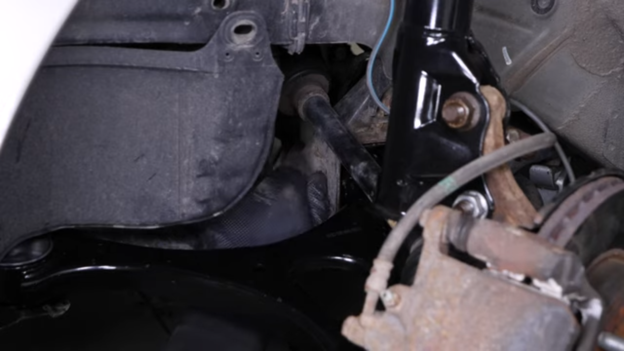 Put the control arm back