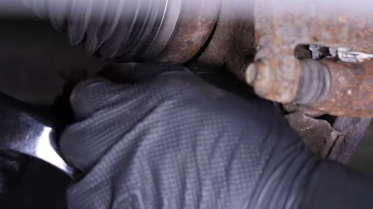 Put the control arm ball joint back