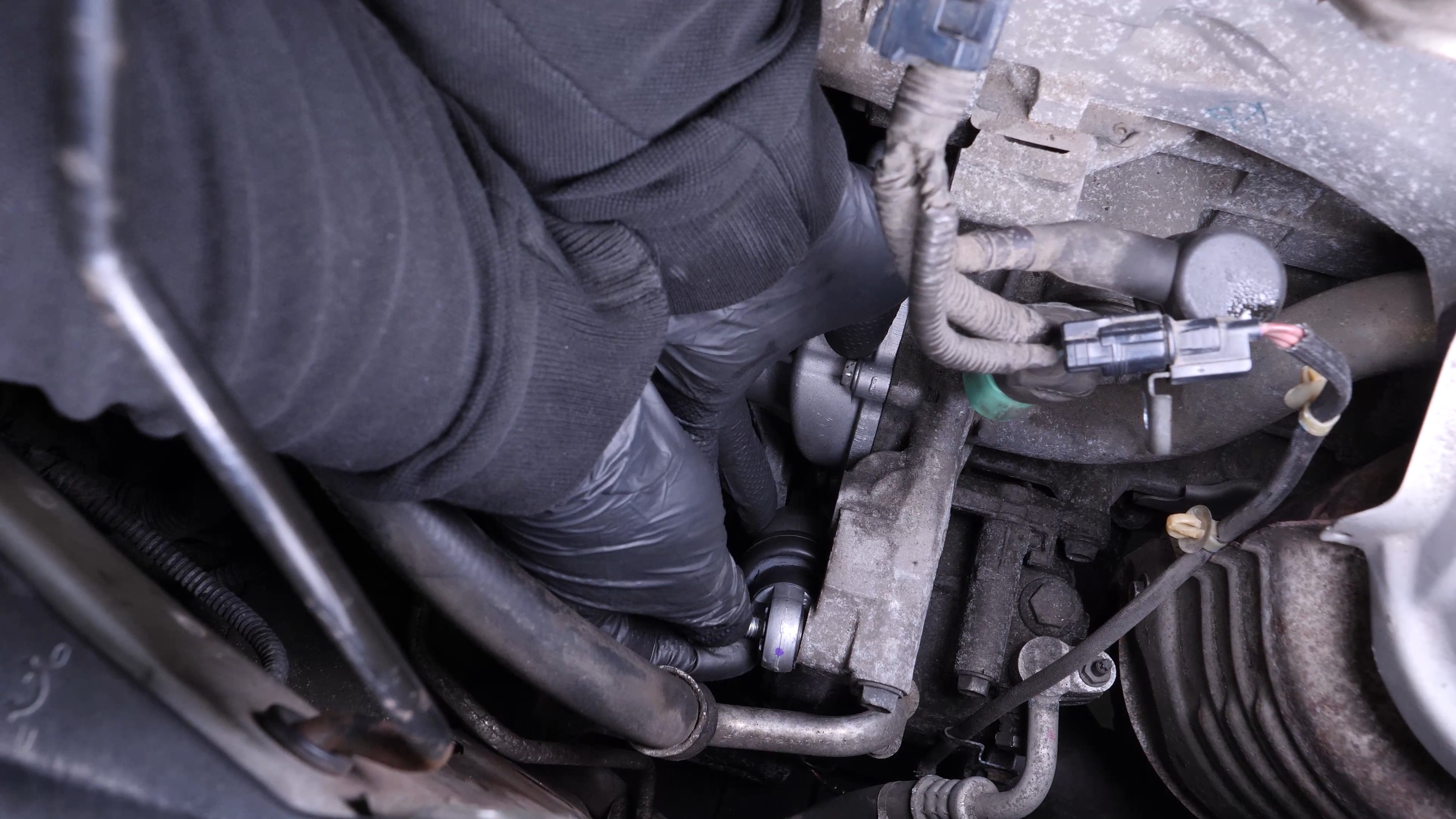 Put the belt tensioner back