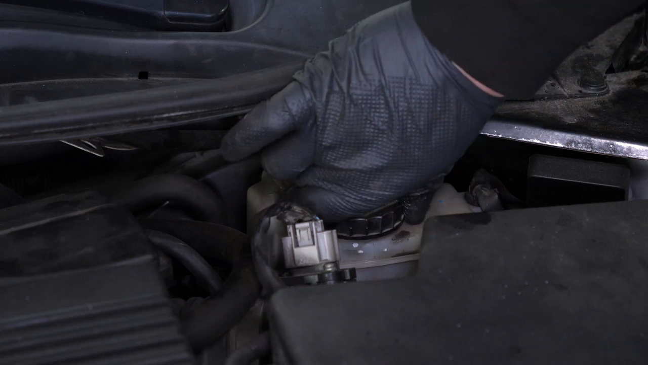 Open the brake fluid reservoir