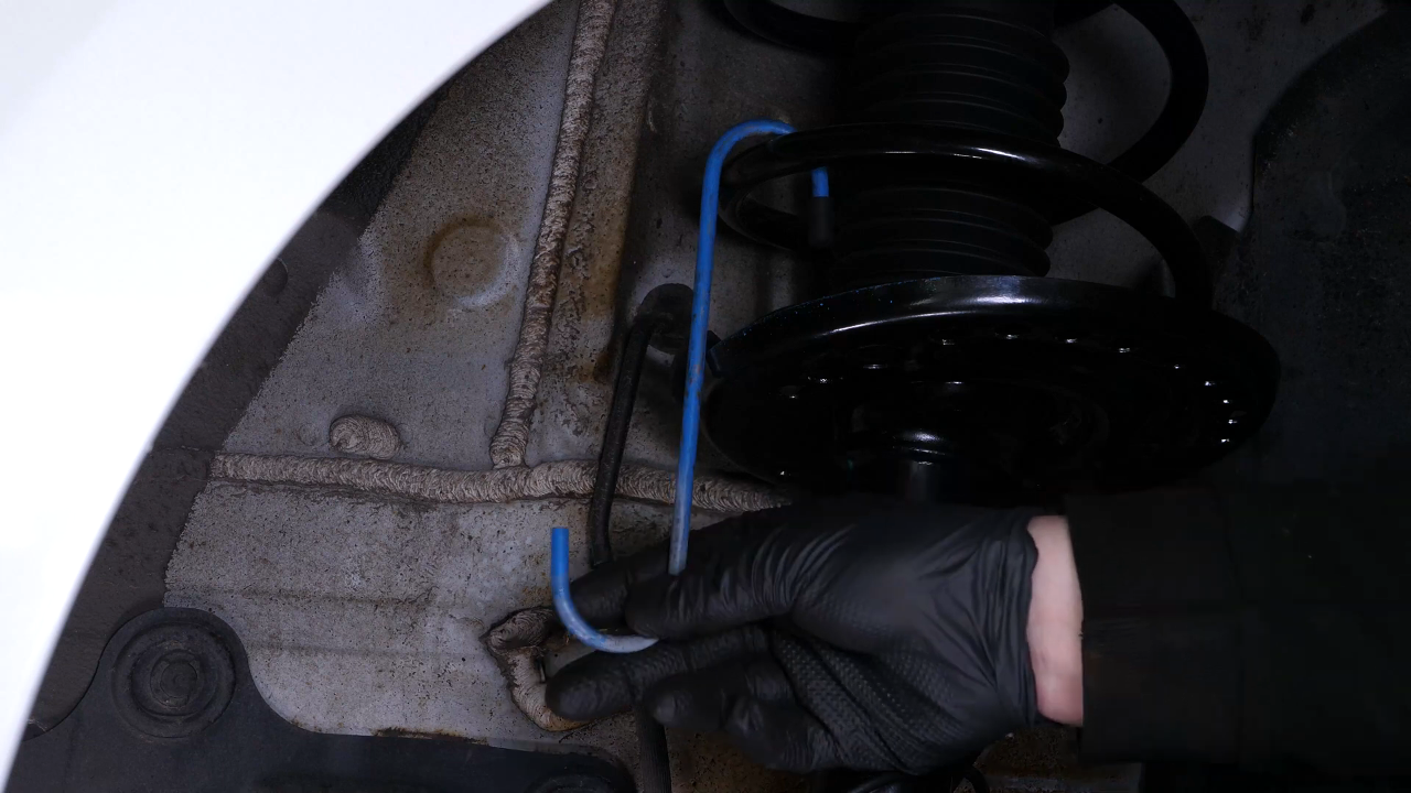 Put the brake caliper back