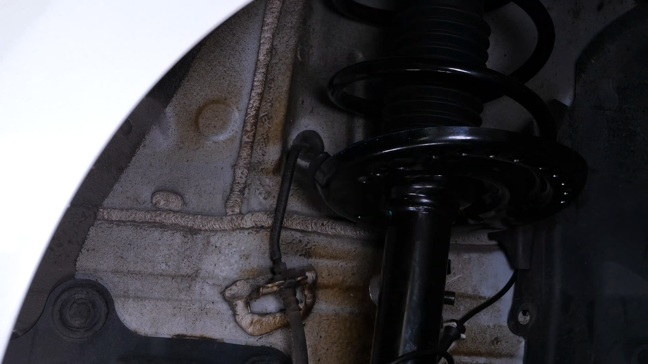 Put the brake caliper back