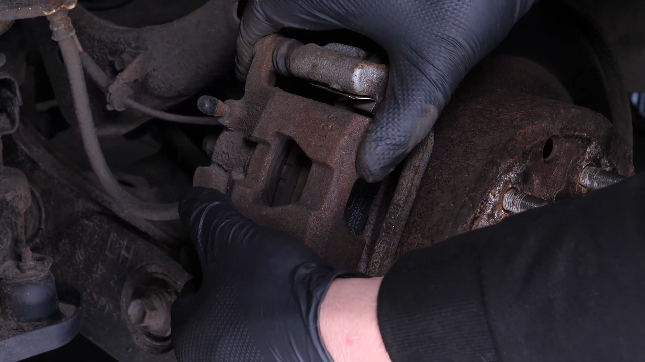 Remove the  brake caliper
