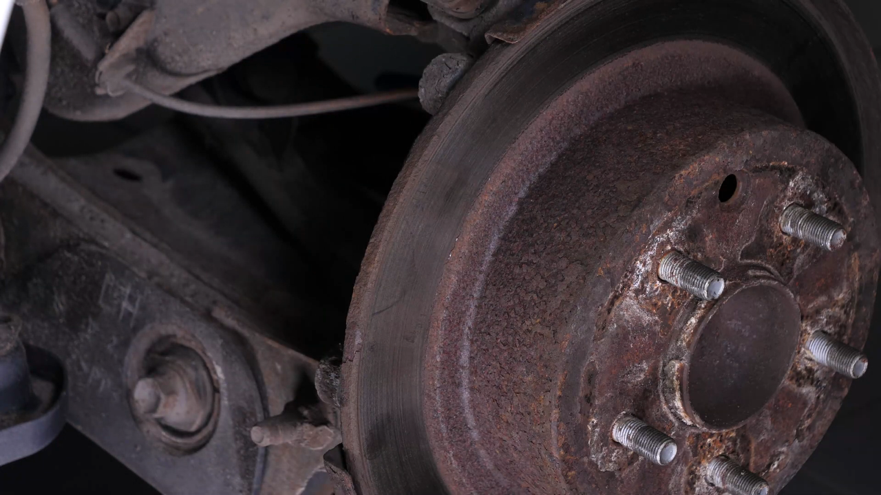Remove the brake caliper mount