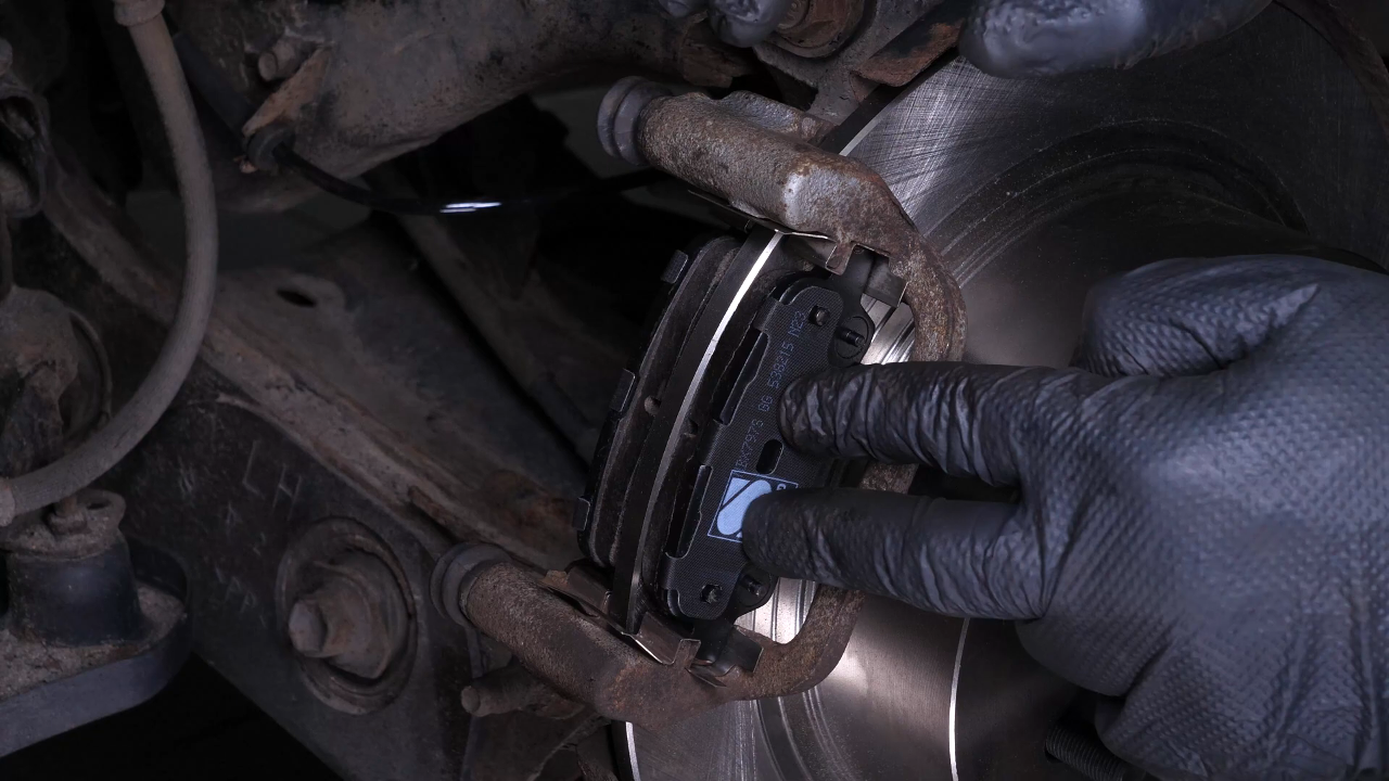 Place the new brake pads