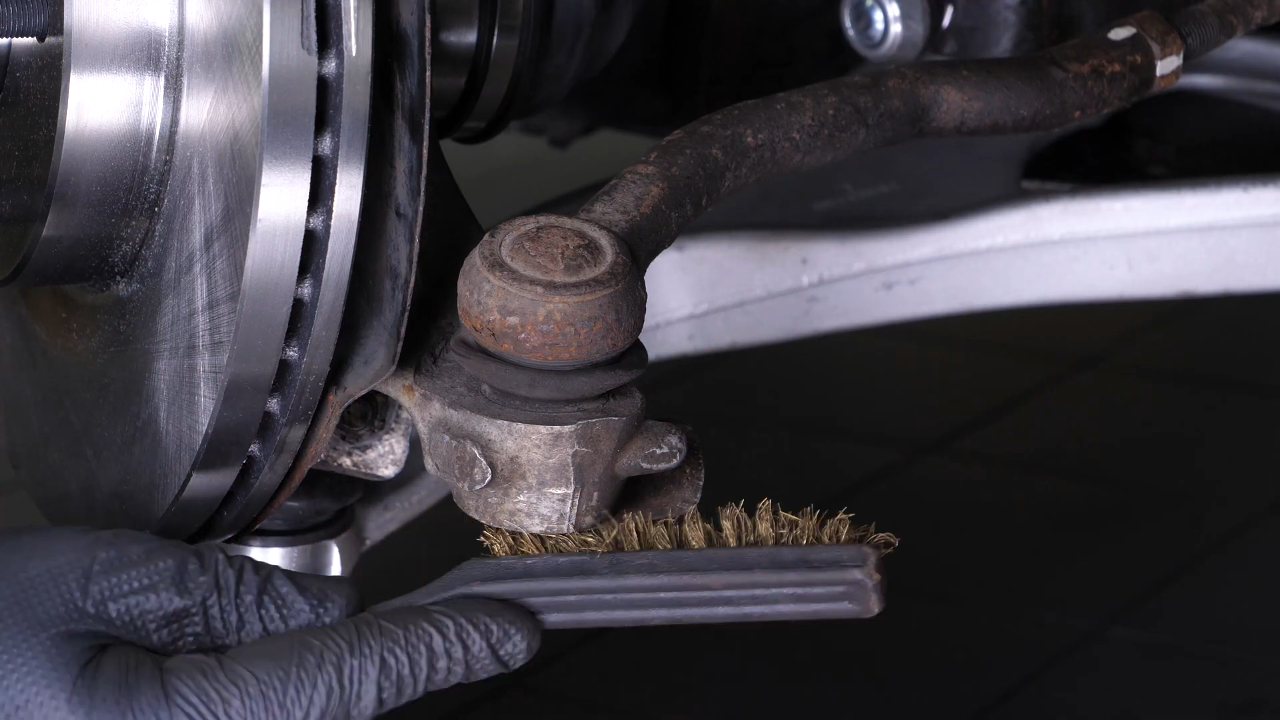 Loosen the holding nut