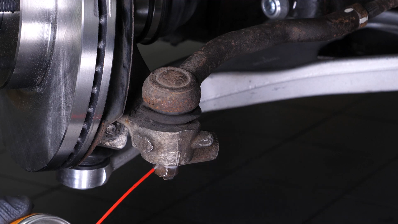 Loosen the holding nut