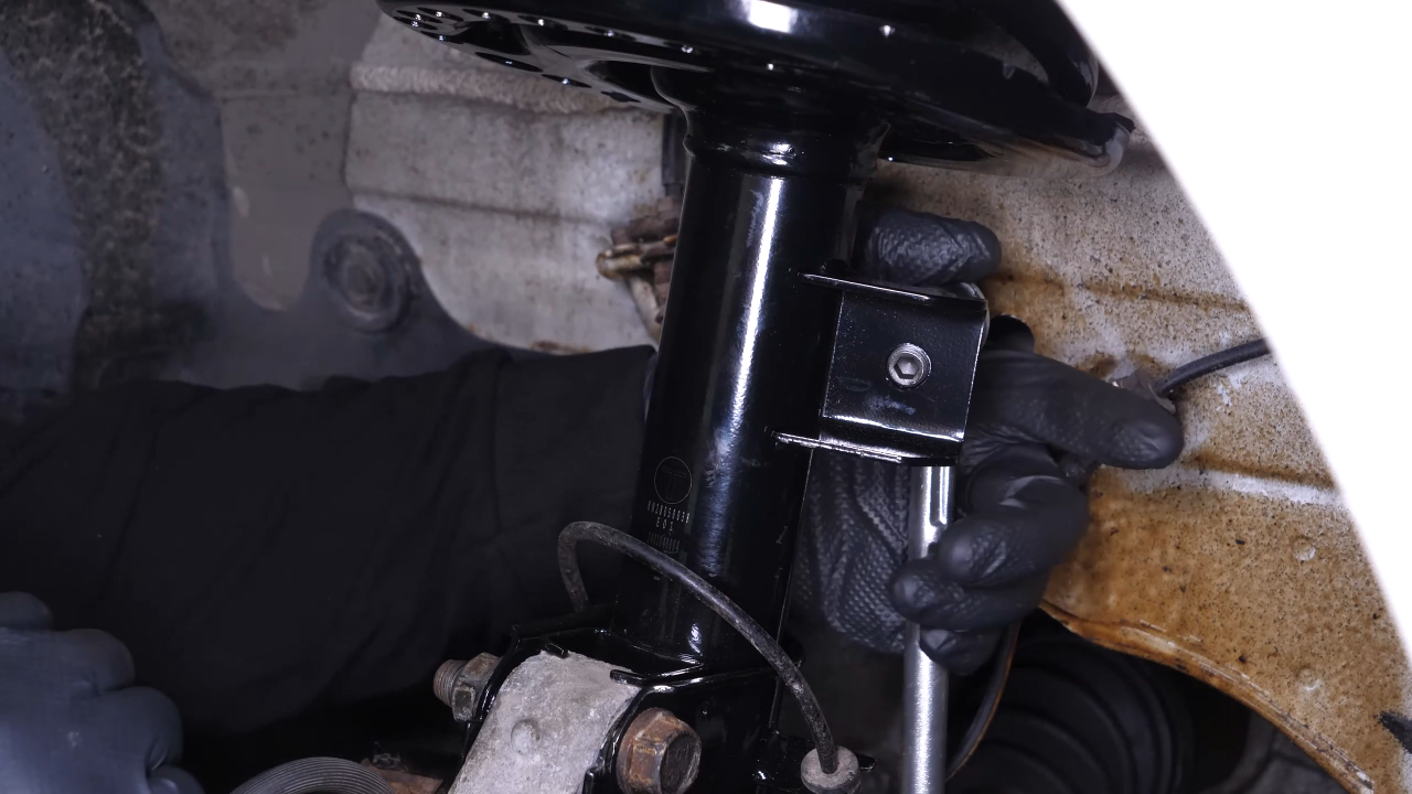 Put the outer tie rod back
