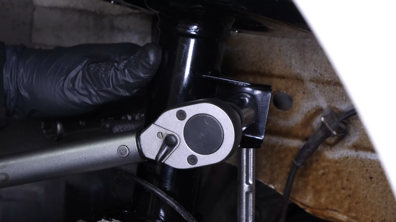 Put the outer tie rod back