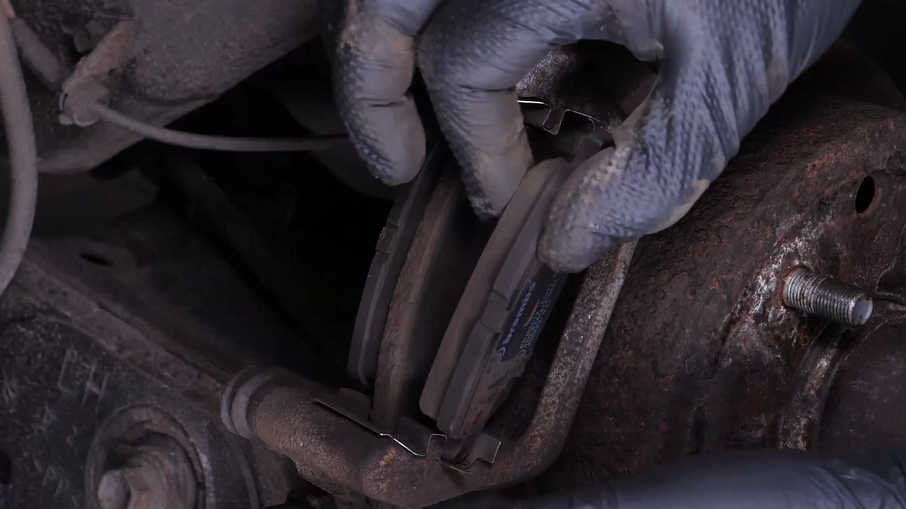 Remove the brake caliper