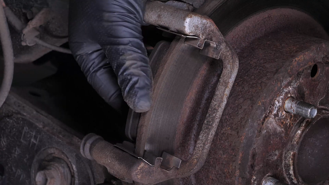 Remove the brake caliper