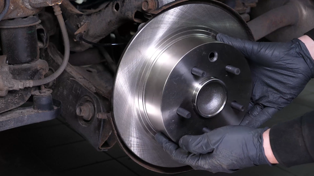 Put the brake disc back