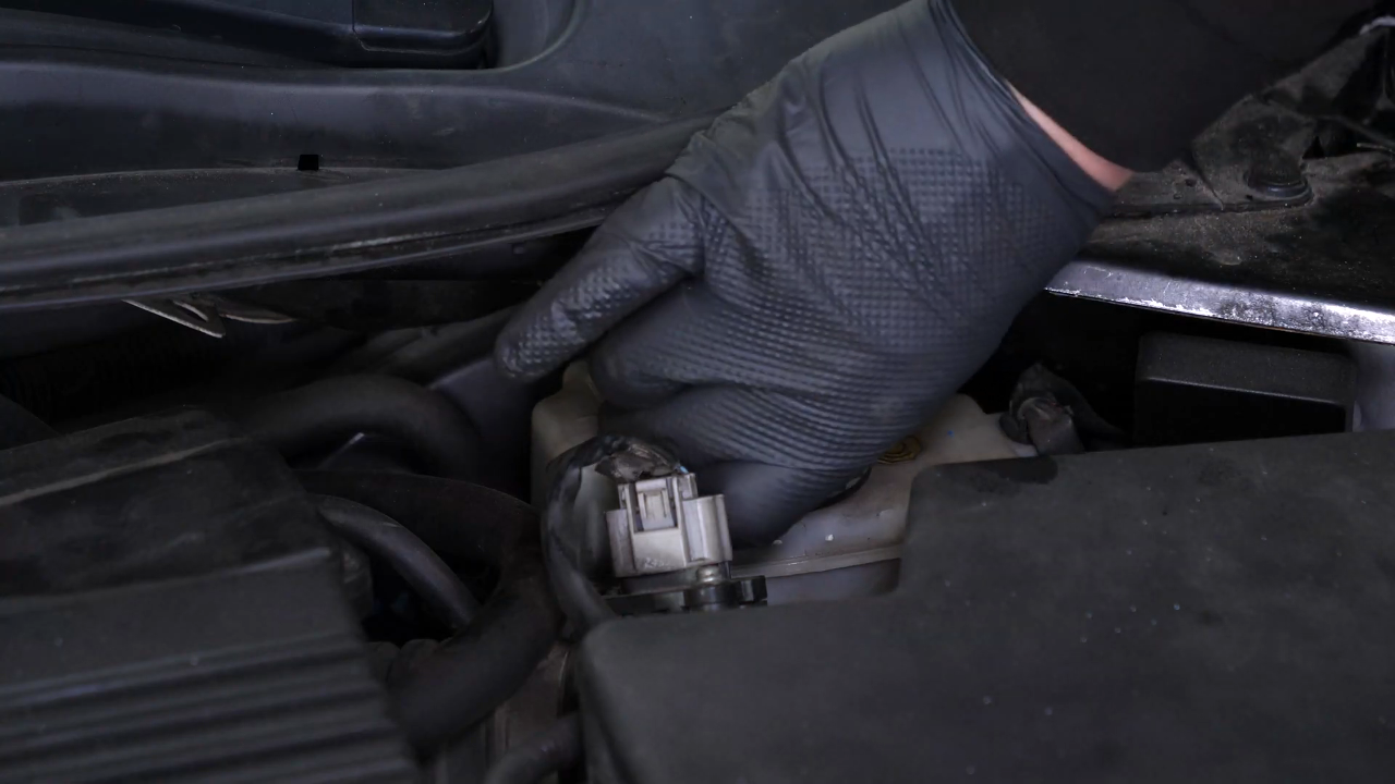 Open the brake fluid reservoir