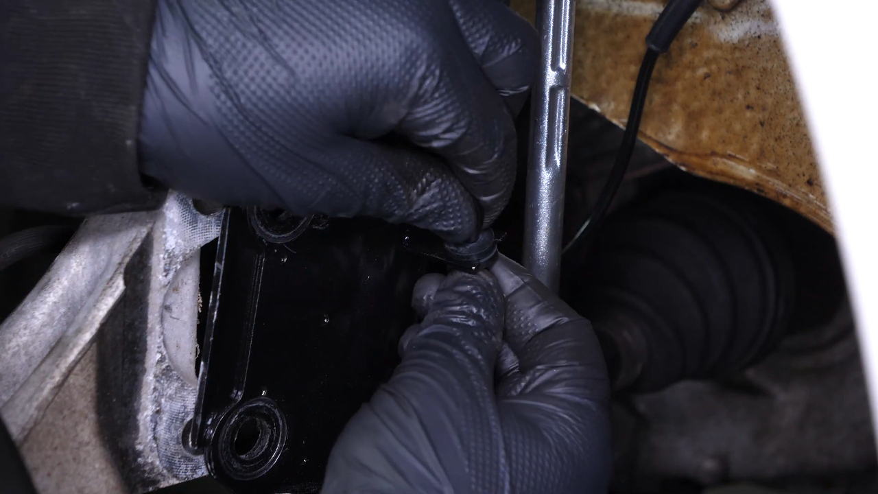 Disconnect the ABS and brake hose connectors