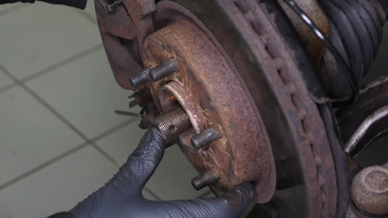 Remove the wheel knuckle